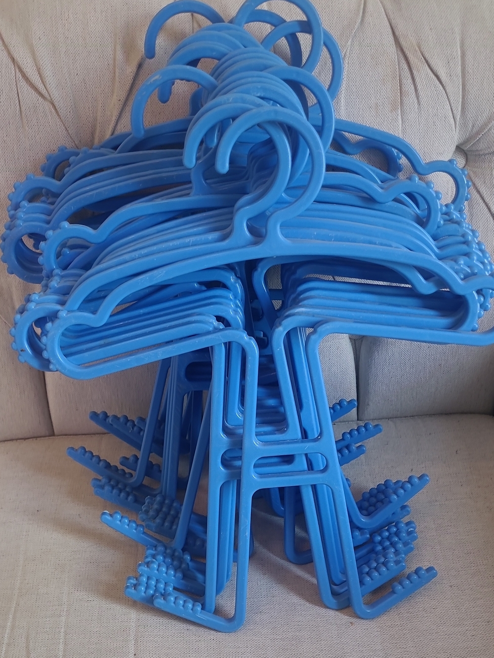Set of Blue Plastic Clothes Hangers